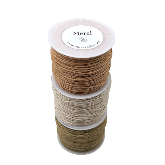 Spool of ecru waxed cotton thread 001 70m 1mm